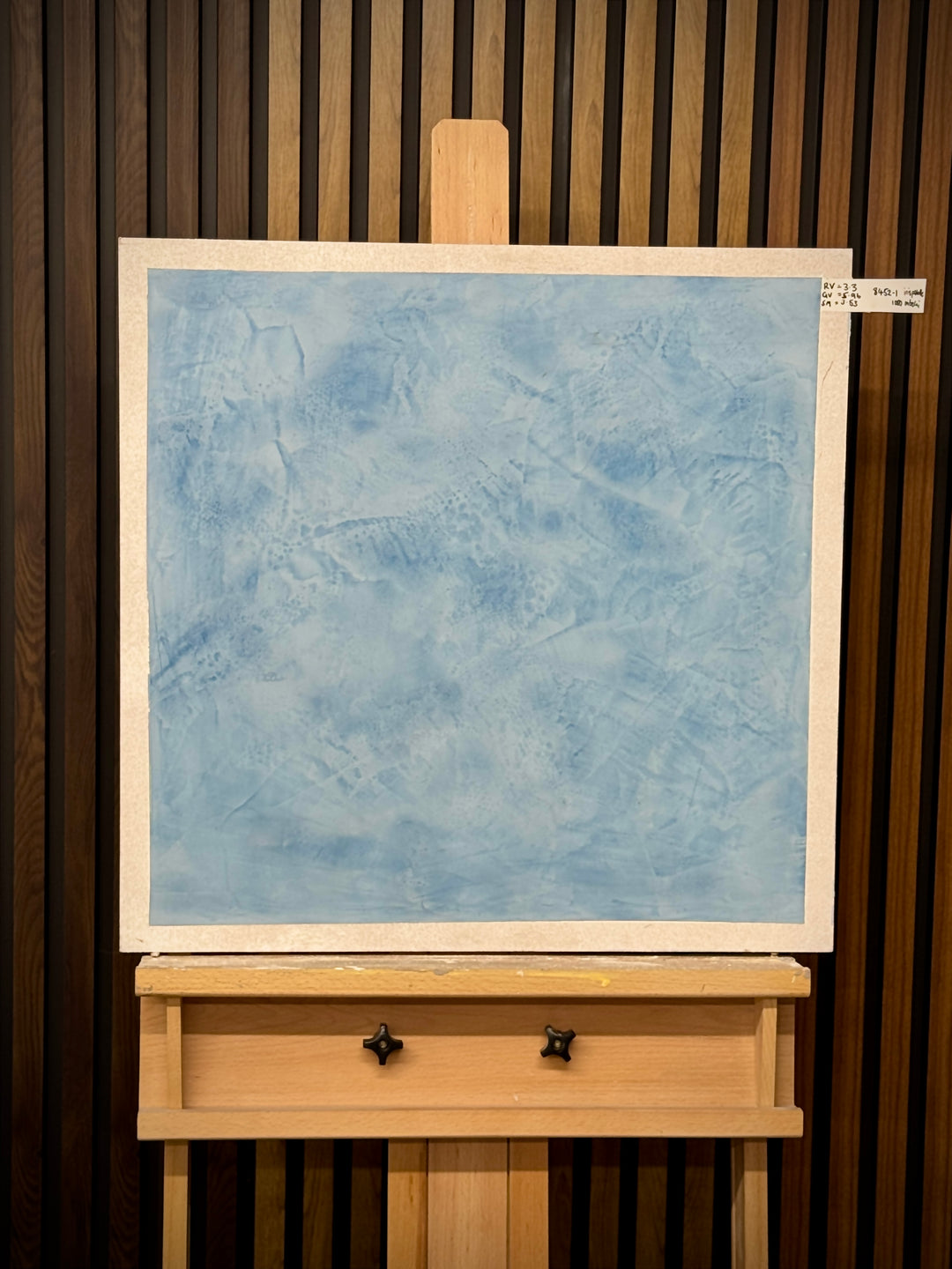 sample of polished plaster on an easel